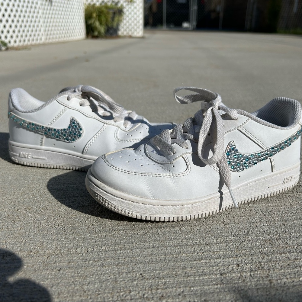 Custome rhinestone Nike Air Max swooshes are crystal rhinestones. Youth size 3.